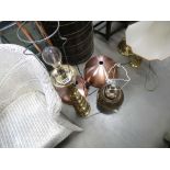 Three brass table lamps plus a floor lamp