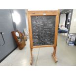 Pine menu board with racks and cupboard to rear