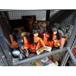 Cage containing a quantity of Japanese dolls, ornaments and crockery