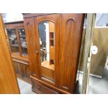 Late Victorian wardrobe with single mirrored door and drawer under