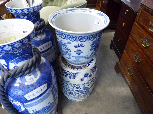 Blue and white garden barrel with jardiniere