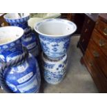 Blue and white garden barrel with jardiniere