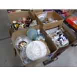 Four boxes containing children's toys and dolls, carriage clock, cheese dish, blue and white