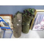 Two military rucksacks with a quantity of clothing and equipment