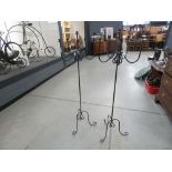 Pair of wrought iron candlesticks