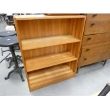 A pine open fronted bookcase