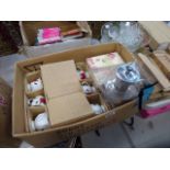 Box containing floral patterned crockery, teapot