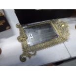Rectangular bevelled mirror in brass frame