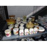 Cage containing kitchen storage vessels