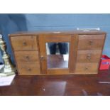 Oak apprentice table top 6 drawer cabinet with mirror to the centre