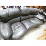 Brown leather effect 3 seater sofa plus a matching armchair and footstool