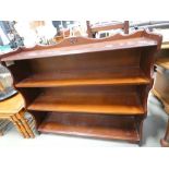 Dark wood open fronted bookcase