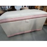 Pink and cream fabric ottoman