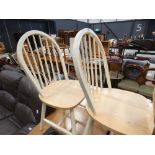 5334 - A pair of cream stick back dining chairs