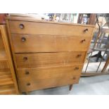 5143 - A teak chest of five drawers