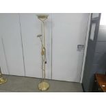 A brass finished mother and child floor lamp