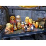 Cage containing Russian dolls and ornamental figures