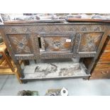 Heavily carved oak buffet