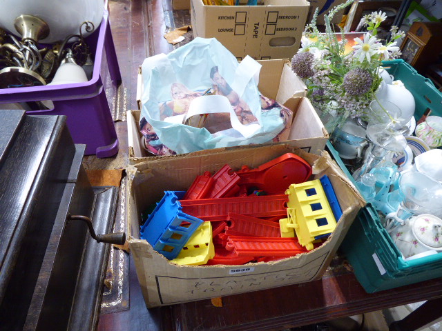 Three boxes containing lego parts