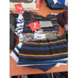 3 Puma t-shirts and 1 pair of shorts