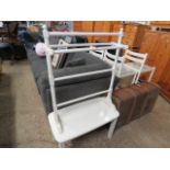 Modern white coffee table and white painted towel rail