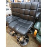 Modern black leatherette upholstered bar stool on chrome base