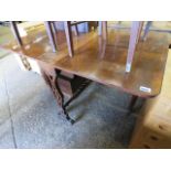 Decorative walnut drop side dining table