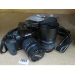 Olympus E-510 digital camera with 2 lenses, lens cover and accessories incl. batteries and battery