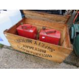 Wooden box containing 2 metal petrol cans