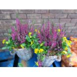 Pair of wicker planted patio tubs