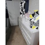 Modern white bedroom suite comprising double door wardrobe with 3 drawers, 4 drawer chest and 3