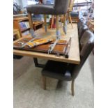 Modern oak top extending dining table with 6 brown button back upholstered dining chairs