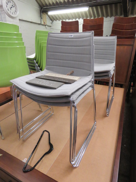6 grey upholstered stackable chairs by arper