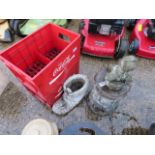 Concrete boot planter, concrete plinth and an ornament together with 2 coca cola crates