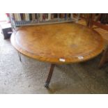 Leather top circular single pedestal occasional table on casters