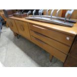 Mid century teak concave fronted sideboard with 2 doors and 3 drawers