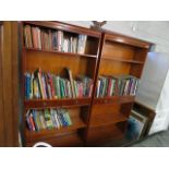 (2104) Pair of yew effect open front bookcases with central drawers