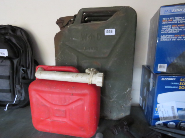 1048 Metal jerry can and a plastic petrol can