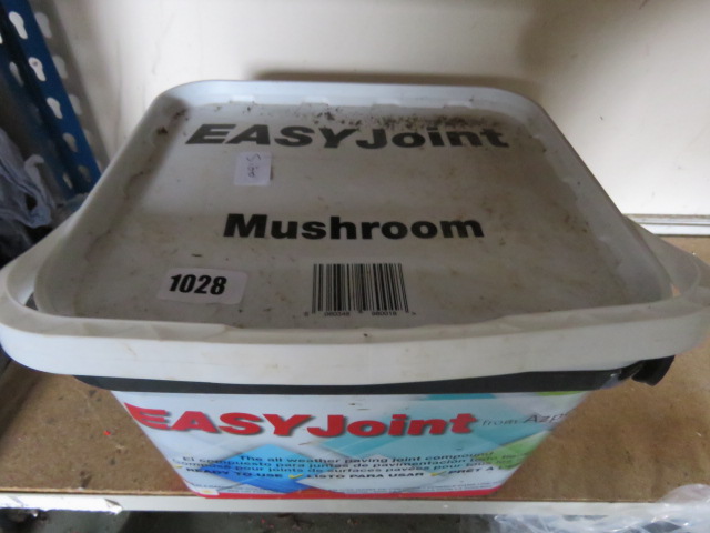 Tub of mushroom coloured easy joint compound