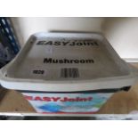 Tub of mushroom coloured easy joint compound