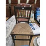 1 rush seated chair and 1 wooden chair