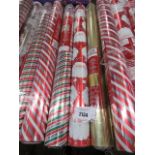 3 rolls of Christmas wrapping paper