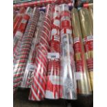 3 rolls of Christmas wrapping paper