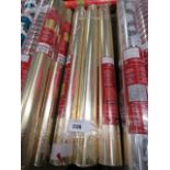 3 rolls of Christmas wrapping paper