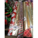 3 rolls of Christmas wrapping paper