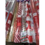 3 rolls of Christmas wrapping paper