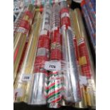 3 rolls of Christmas wrapping paper