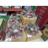 Collection of round pinecone wreath centrepieces