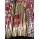 3 rolls of Christmas wrapping paper