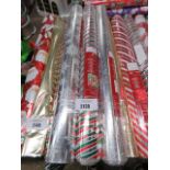 3 rolls of Christmas wrapping paper